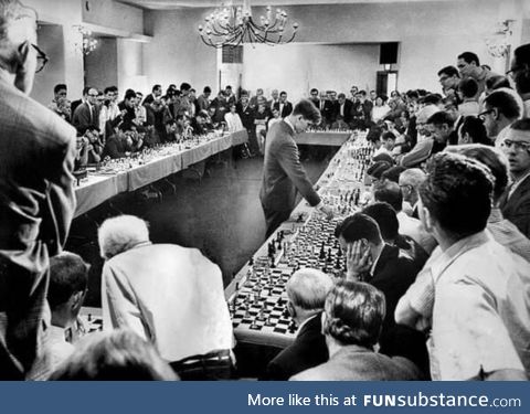 Bobby Fischer playing 50 opponents simultaneously, 1964. He won 47 of the matches, drew 2