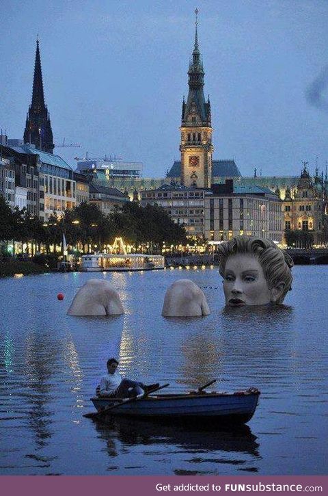 Statue of a Lady taking Bath in lake, Hamburg, Germany