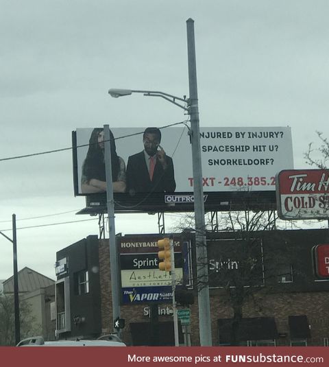 Someone put up this billboard making fun of all of the injury lawyers in Detroit