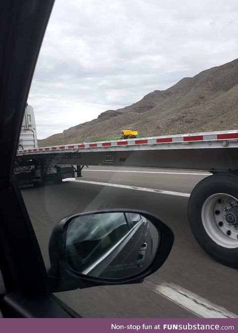 This truck carrying nothing but a toy dumptruck