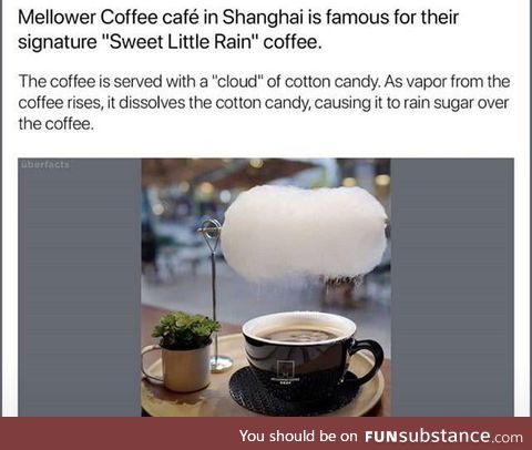 Coffee served with cloud of cotton candy. Vapour from the coffee causes it to rain sugar