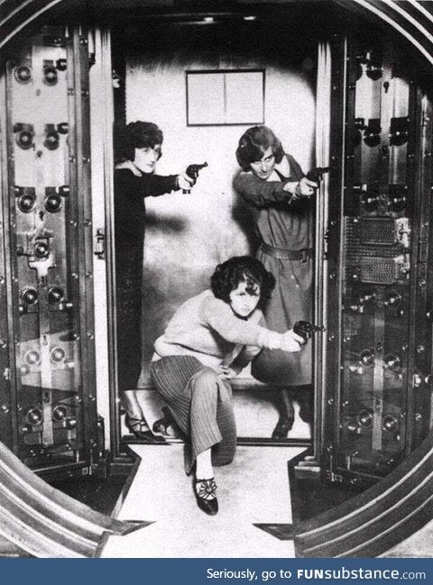 The employees at Cleveland Trust Bank Co. Being trained to defend the bank vault, circa