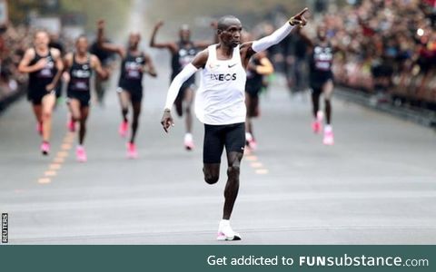 This guy just ran a marathon in under 2 hours, as the first human ever! [1:59:40]