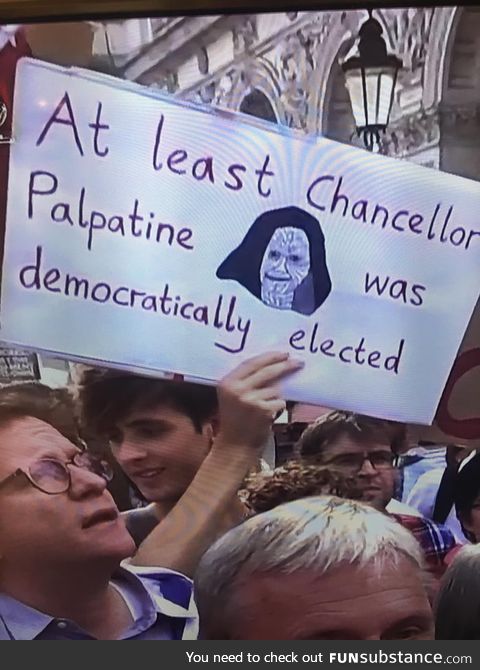 One of the signs at the protests against Boris Johnson in the UK