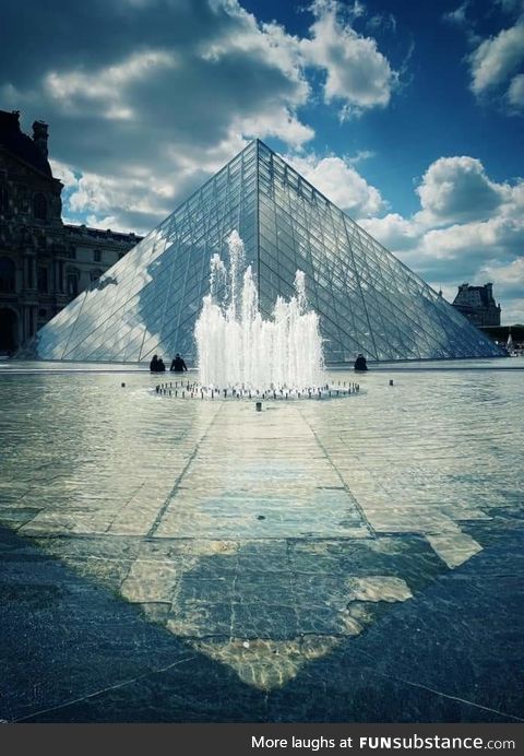 France. Louvre Musée. Pyramid reflexion