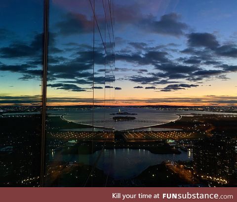 Pic from the 46th floor of a building in Jersey City. The Statue of Liberty is visible in