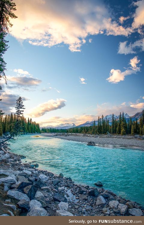 Yes, the water was really that blue. ( Kootenay River, 50 Miles West of Banff, AB )