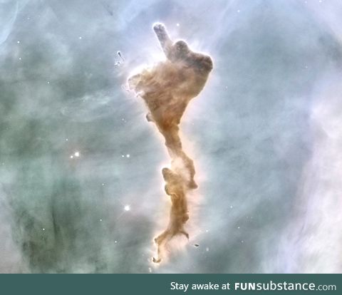 The "Finger of God" Within the Carina Nebula