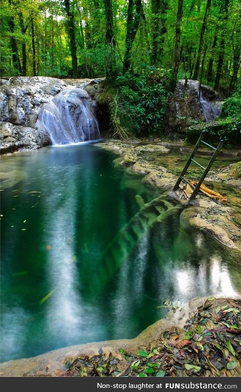 Deep ladder in a waterfall