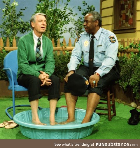 Mr Rogers breaking racial boundaries by sharing a pool with Officer François Clemmons