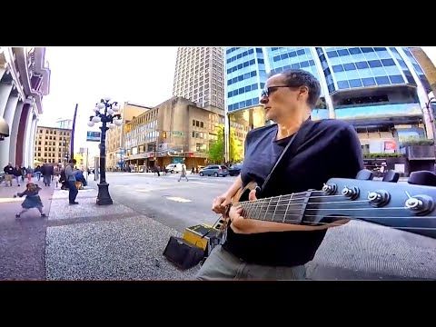 Little Girl Dancing to ZZ Top Street Musician