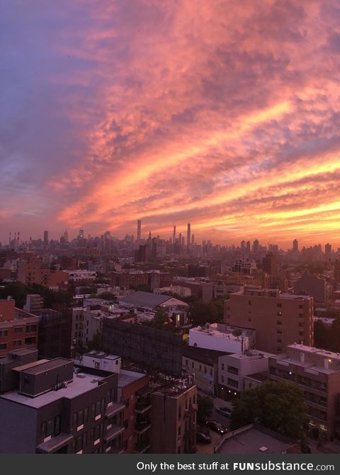 The sky over Manhattan would’ve made Bob Ross proud