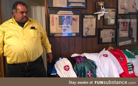 Daryl Davis, who befriended dozens of KKK members, shows off collection of robes