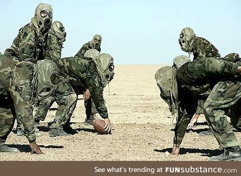 British and German soldiers play football during the Christmas Truce