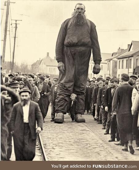 The last giant being paraded through the streets