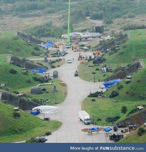 Full scale falcon and x-wing hangers in the English countryside