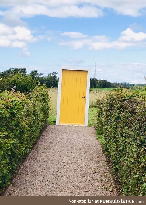 A doorway to a field