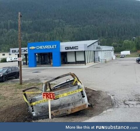 Someone put a FREE sign on a burnt out truck