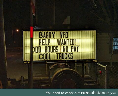 Volunteer firefighter sign in a small town