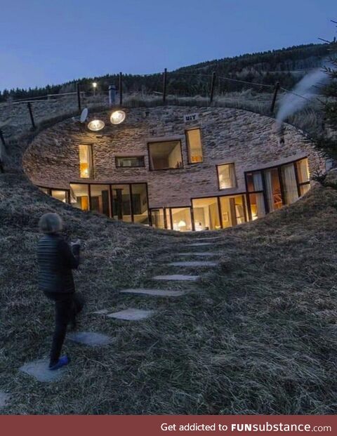 This interesting home built into a hill