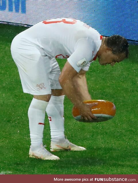 Swiss fans threw Shaqiri a wheel of cheese after his winning goal