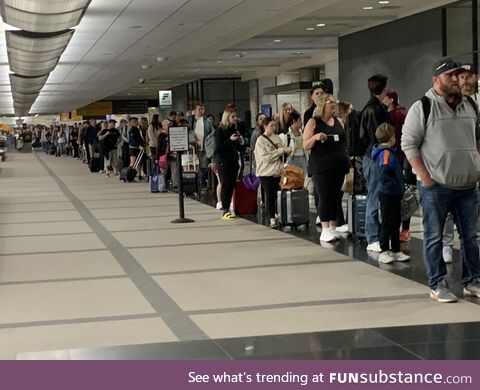 Get to DIA early folks - the general security line is longer than a quarter mile