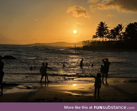 People enjoying the Sunset at Poipu Beach, Kauai Hawaii tonight