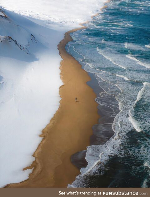 A beach in Japan where snow, sand and sea meet each other