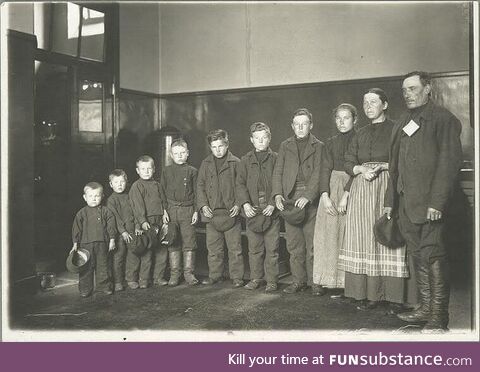 An immigrant family arriving at Ellis island in 1904