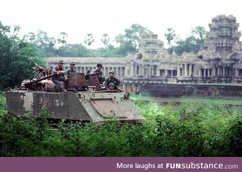 Vietnamese M113 crew resting infront of Angkor Watt, Vietnam & Cambodia against the