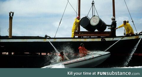 Green peace activists attempting to stop nuclear waste being dumped at sea