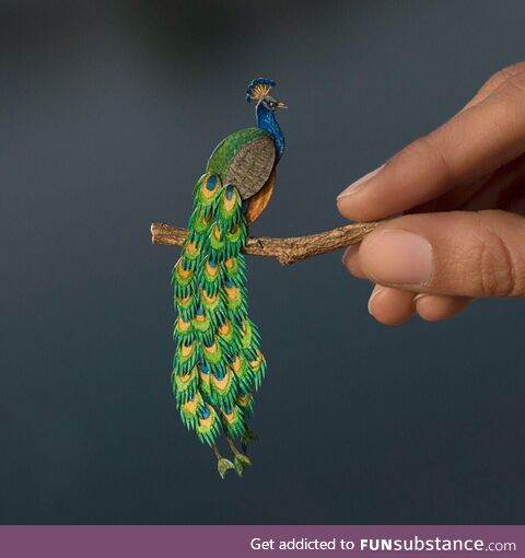 Miniature paper cut artwork of Peacock hand painted with watercolours