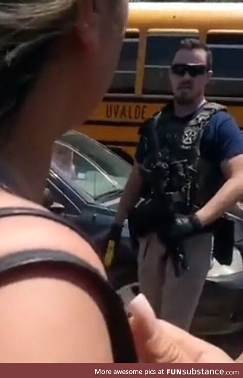 [OC] Cop w/assault rifle ready to tase parents but won't help children in a school