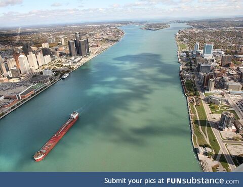 This is how close Detroit is from Canada. This is the YouDontSwimInHereEver River in the