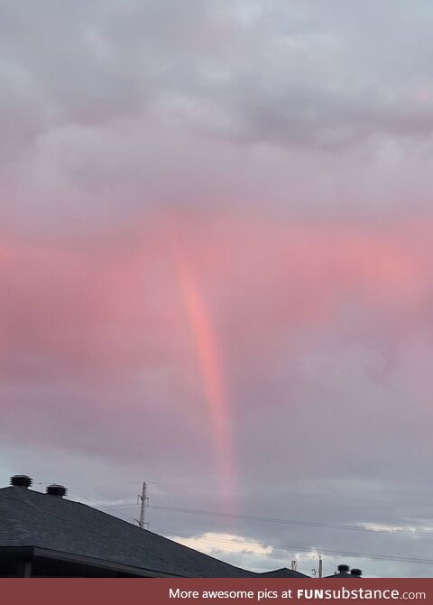 Rainbow behind clouds at sunset [OC]