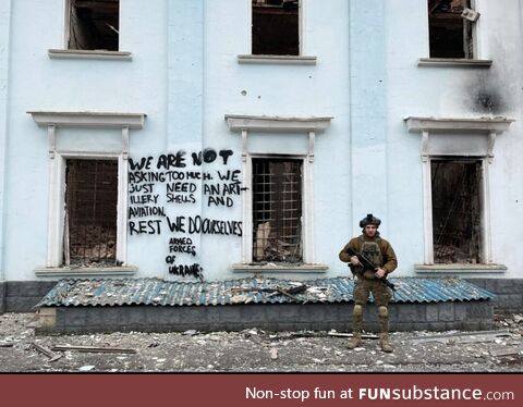 A Ukrainian Standing in Front of a Building