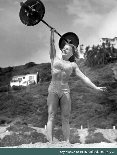 Abby Stockton Playing with a weight in California Beach 1940s