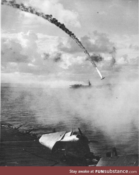 Japanese plane shot down during the battle of Saipan . 1944