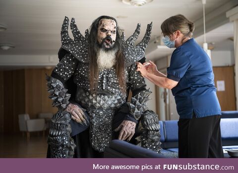 Frontman of finnish band Lordi getting second dose of COVID vaccine in full costume