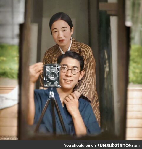 A Japanese couple taking a self portrait together in 1920