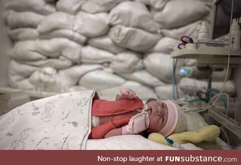 Sand-bagged room protecting babies from russian missiles at a children's hospital in Kyiv