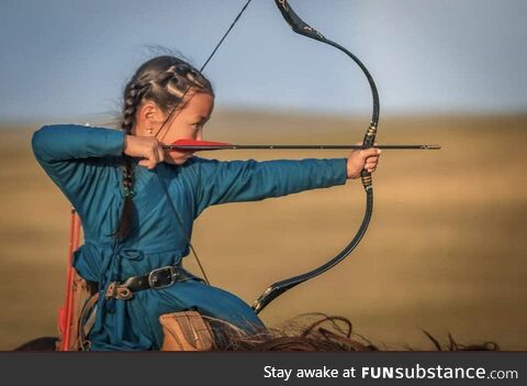 Amazon Angarag, age 5, horseback archer of Mongolia