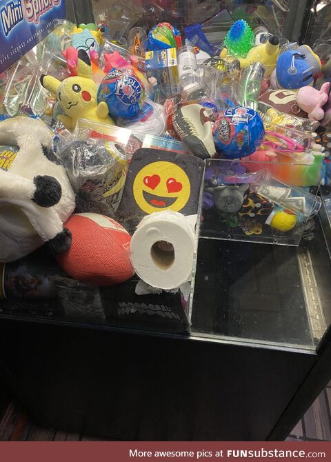 Someone put a roll of TP in the claw machine