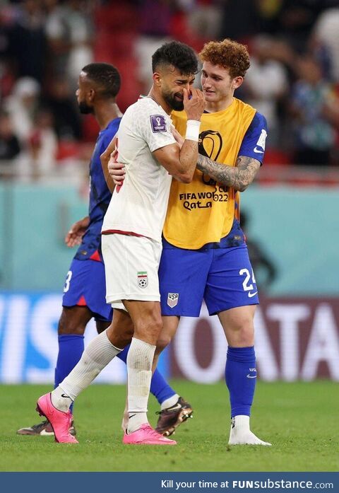 American player consoles his Iranian counterpart as USA beats Iran 1-0