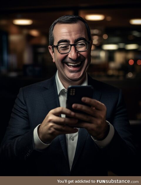 John Oliver using Apollo to browse  to look at all the sexy pics of himself