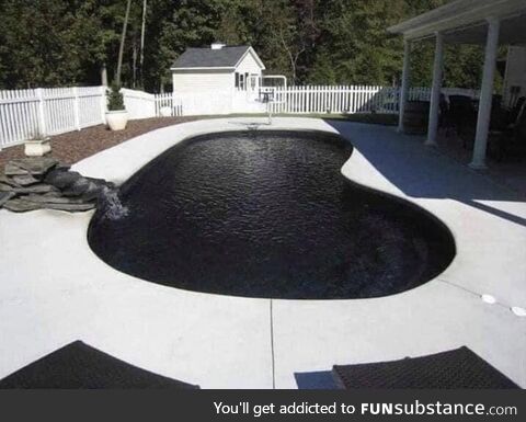 A swimming pool with a black liner looks like a death void into Hell