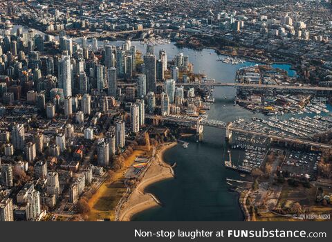 Vancouver, BC’s False Creek area from an airplane window. Zoom in to see all the