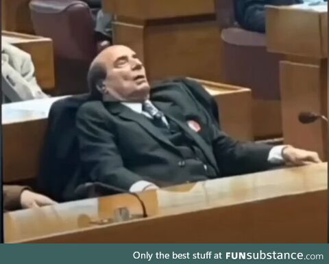 A prominent Pakistani lawyer and politician sleeping in parliament during heavy shouting