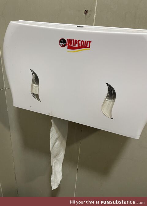 Manufacturer’s name doubles as instructions on a toilet roll dispenser