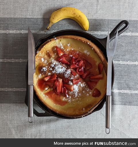 This dutch baby my wife made me for breakfast (banana for scale)